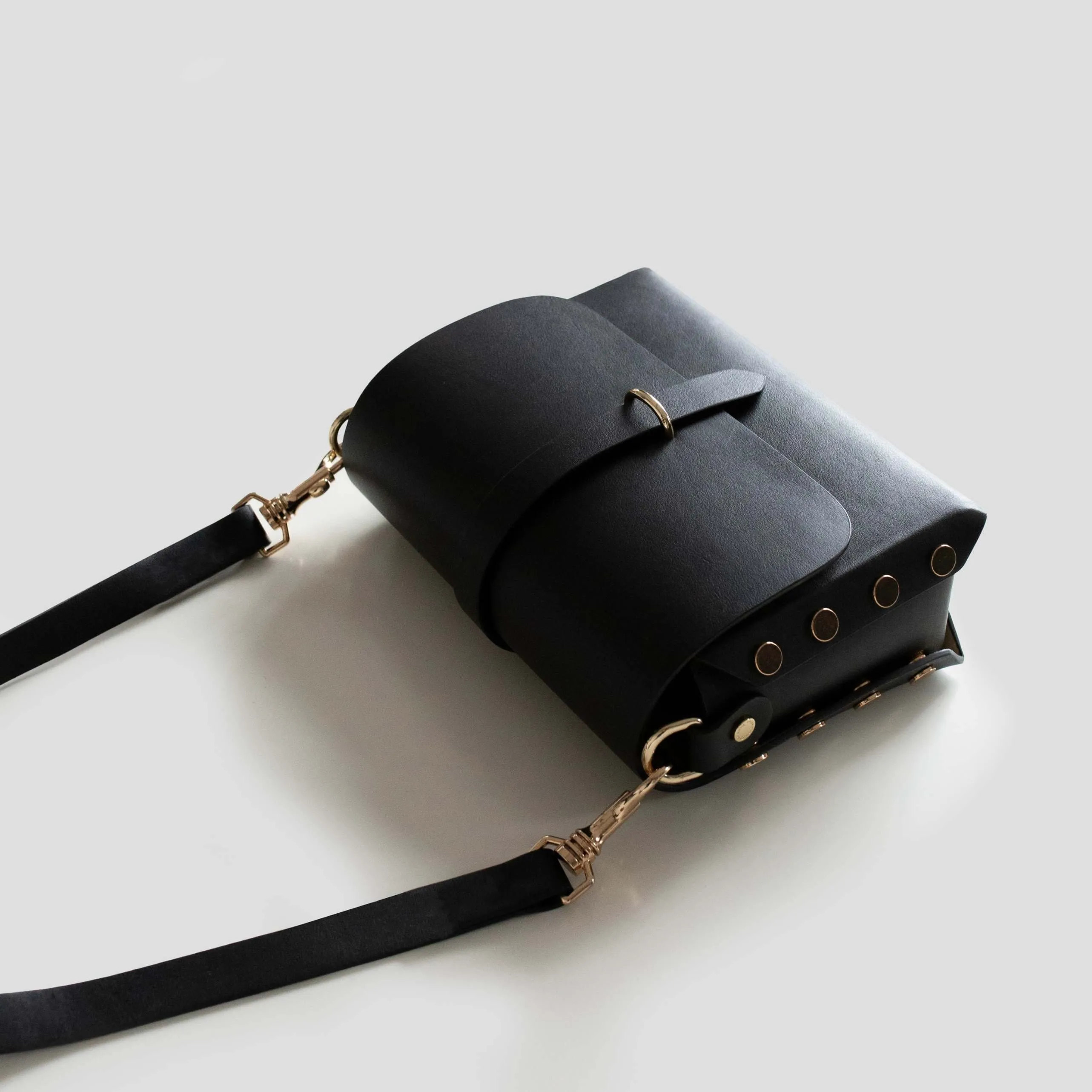 The WEEK/END Vegan Leather Stripped Crossbody Bag | Black